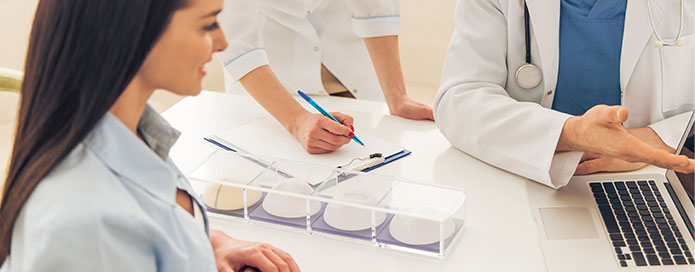 Reviewing breast implant options with patient